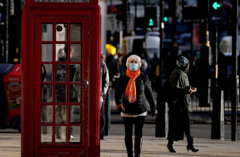 UK hikes virus alert level as omicron variant surges