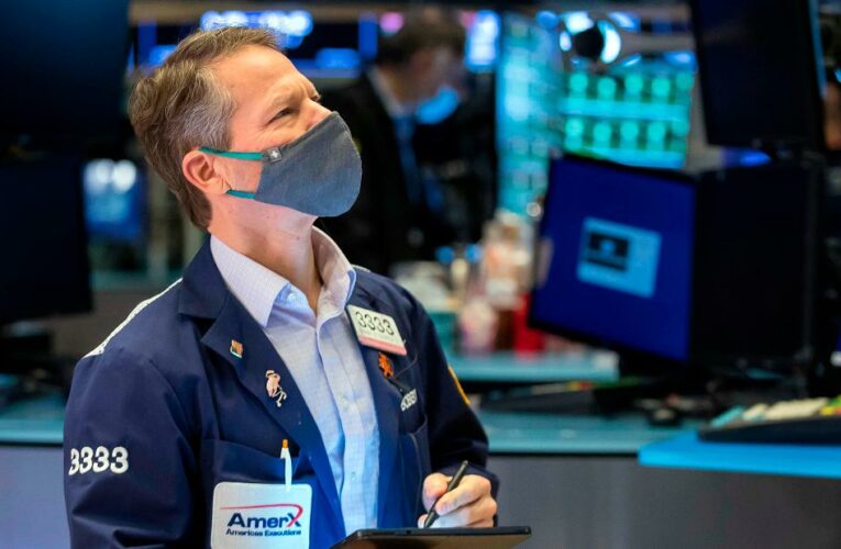 Stocks are still down but Dow revives hopes for a turnaround Tuesday