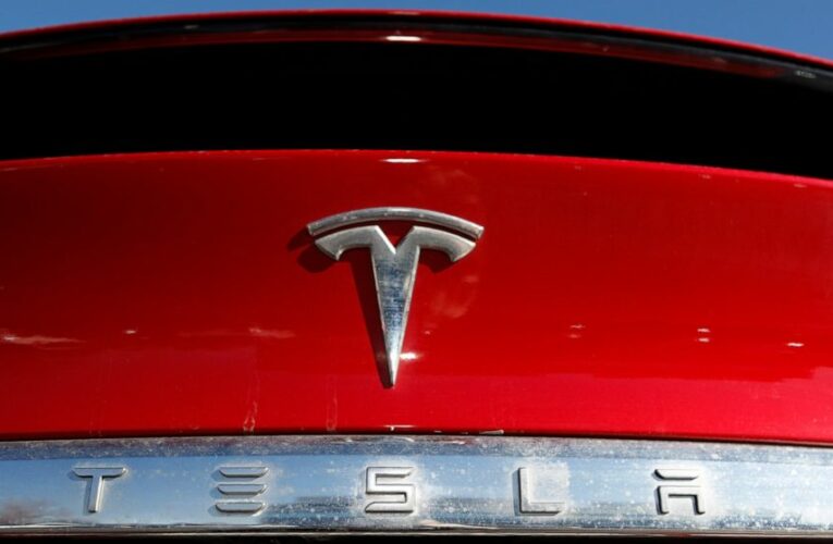 Tesla posts record profits as its deliveries soared in 2021