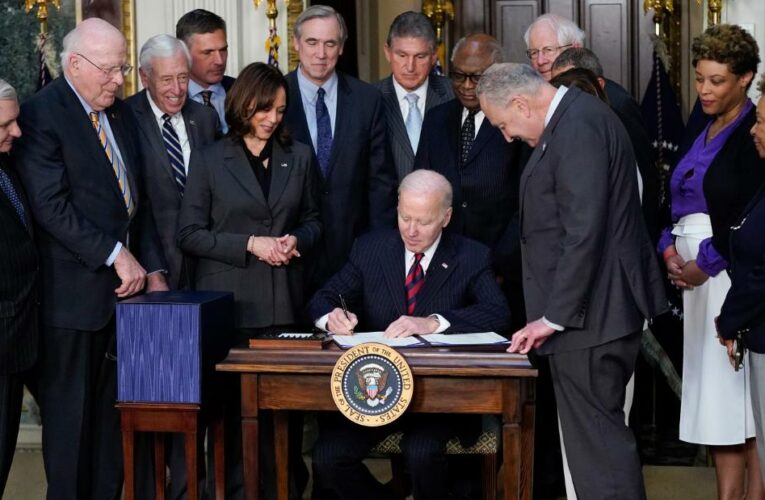 Biden signs massive spending bill into law that dedicates billions to Ukraine aid