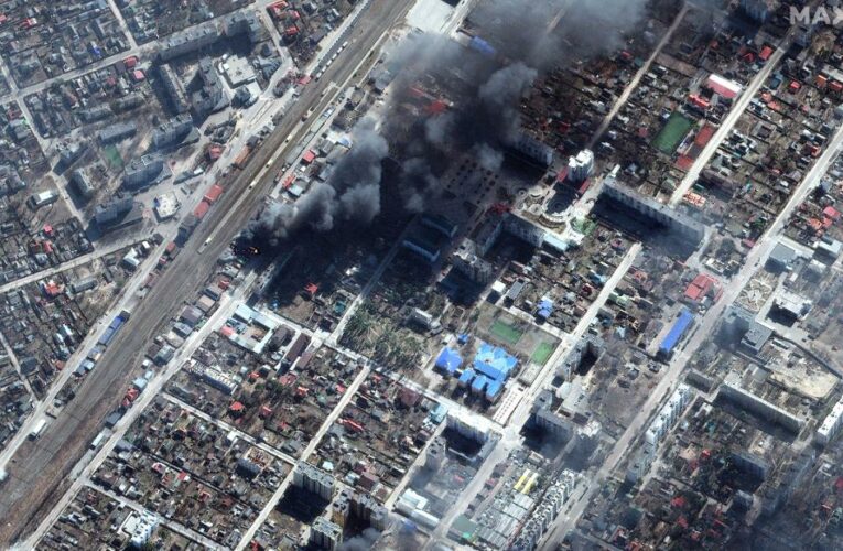 Images show Russian troops dug in around the city, as world leaders prepare for emergency summits in Europe