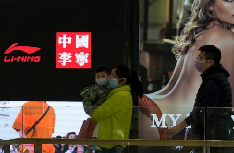 China tries to calm markets by pledging support for economy