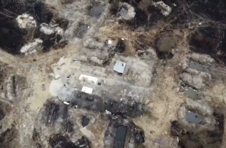 New drone video released by Ukrainian authorities shows abandoned Russian military positions in the highly radioactive Red Forest