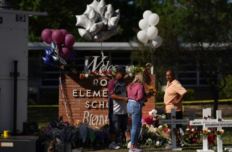 While the shooter was in the school for up to an hour, distraught parents outside clashed with law enforcement officers